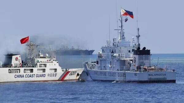 خفر السواحل الصيني: قاربان فلبينيان دخلا مياه بحر الصين الجنوبي بشكل غير قانوني وتسببا بتصادم