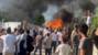 مُصاب نتيجة حريق اندلع في مخيم للنازحين السوريين في البحصة- المنية